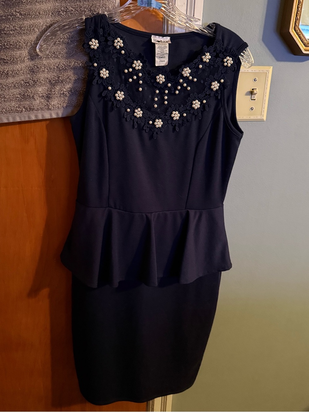 Sleeveless Navy Peplum Midi Dress with Pearl Floral Neckline